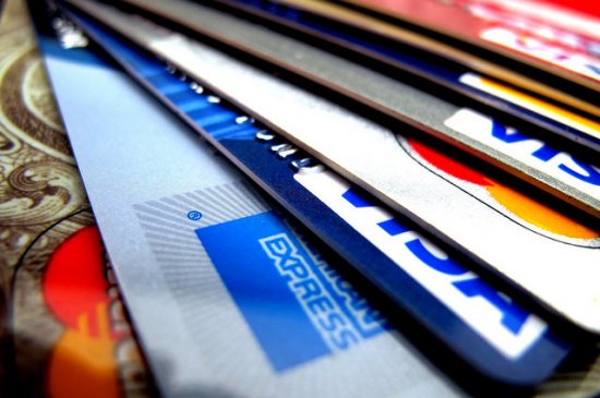 Credit Card Debt Much Higher Than Surveys Report – More Than $15,000 per Household